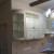 Белый кухонный гарнитур с радиусными дубовыми дверями