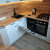 Белый угловой кухонный гарнитур в скандинавском стиле
