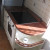 Дубовый кухонный гарнитур бежевого цвета с барной стойкой