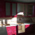 Красная угловая кухня с радиусными фасадами и цветочным декором