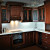 Дубовый угловой кухонный гарнитур с резьбой цвета орех