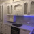 Белая угловая кухня с радиусными фасадами в классическом стиле