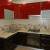 Угловой кухонный гарнитур с двухцветным фасадом