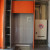 Оранжевый угловой кухонный гарнитур с фасадами из МДФ
