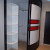 Встроенный угловой радиусный шкаф в коридор с яркими фасадами