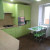Большой зелёный угловой кухонный гарнитур с пеналами