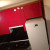 Трехцветный угловой кухонный гарнитур с радиусными фасадами