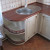 Дубовый кухонный гарнитур бежевого цвета с барной стойкой