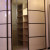 Угловой белый радиусный шкаф купе в коридор