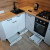 Белый угловой кухонный гарнитур в скандинавском стиле