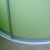 Зеленый угловой радиусный шкаф купе на балкон