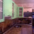 Бежево-зеленый угловой кухонный гарнитур с дверями из МДФ