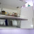 Белая небольшая угловая кухня 8 кв.м с глянцевыми фасадами ЛДСП